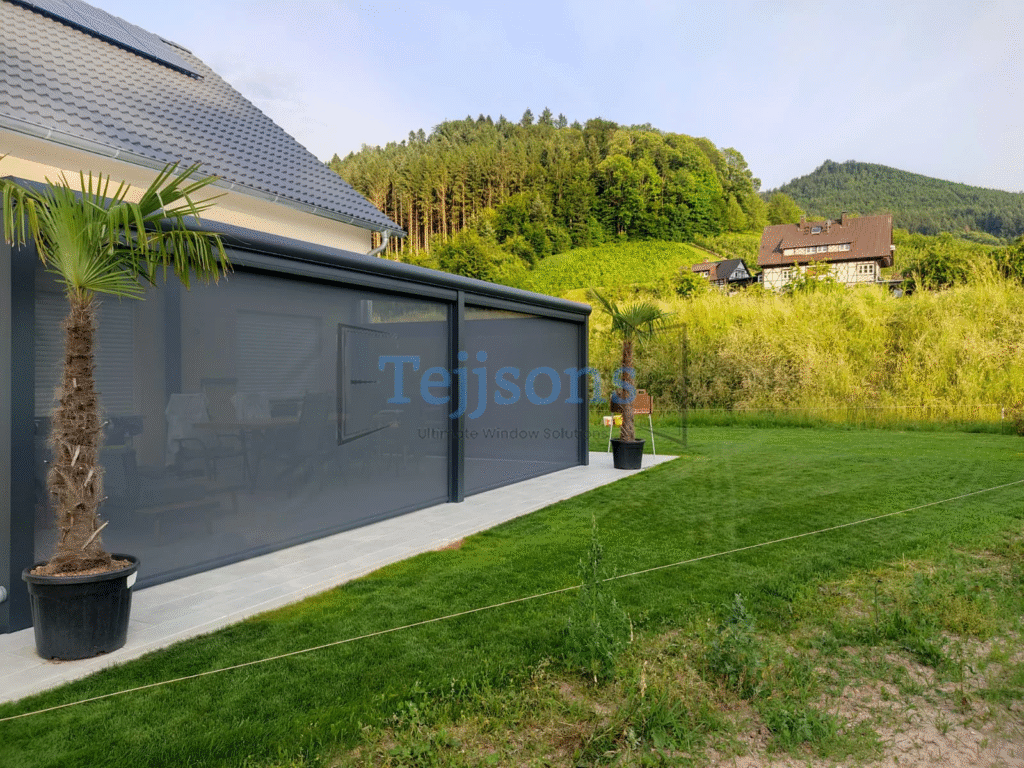 Home patio enclosed with zip blinds for energy efficiency
