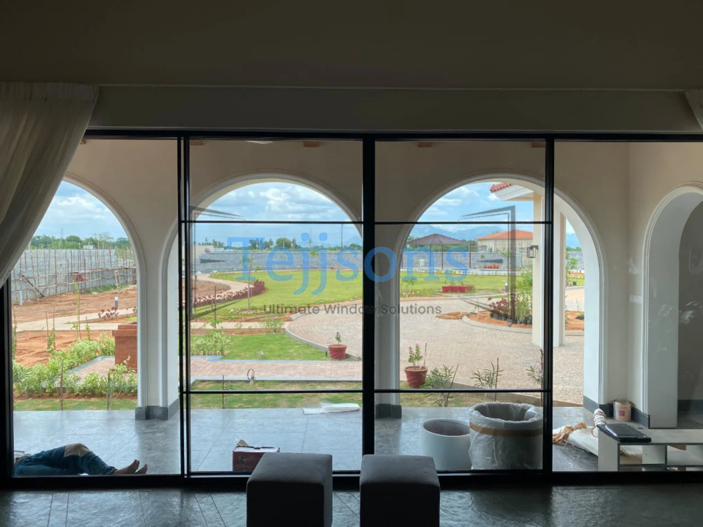 Living room with large aluminium doors and windows 