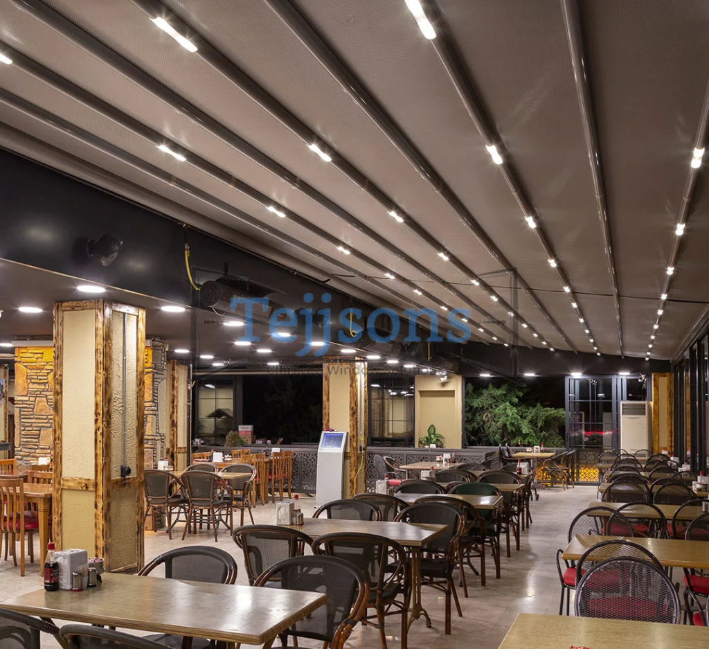 How An Aluminium Pergola Can Transform Your Outdoor Space 4 Restaurant patio covered by a motorized pergola with LED lighting