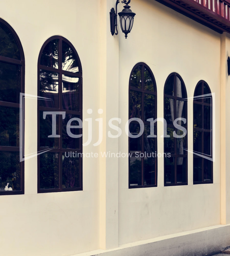 Do Aluminium Windows Increase Property Value? 2 Arched aluminium windows adding classic charm to an exterior facade