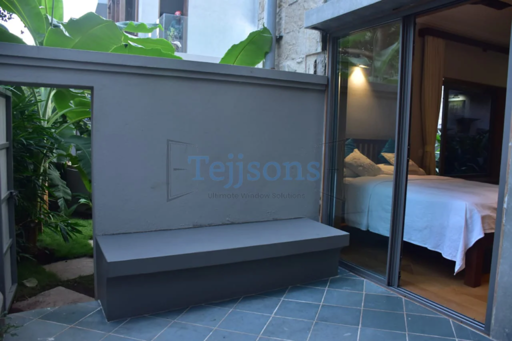 How to Choose the Right Main Door That Stands Up to Rain and Heat 2 Elegant bedroom entrance with modern aluminium sliding main door