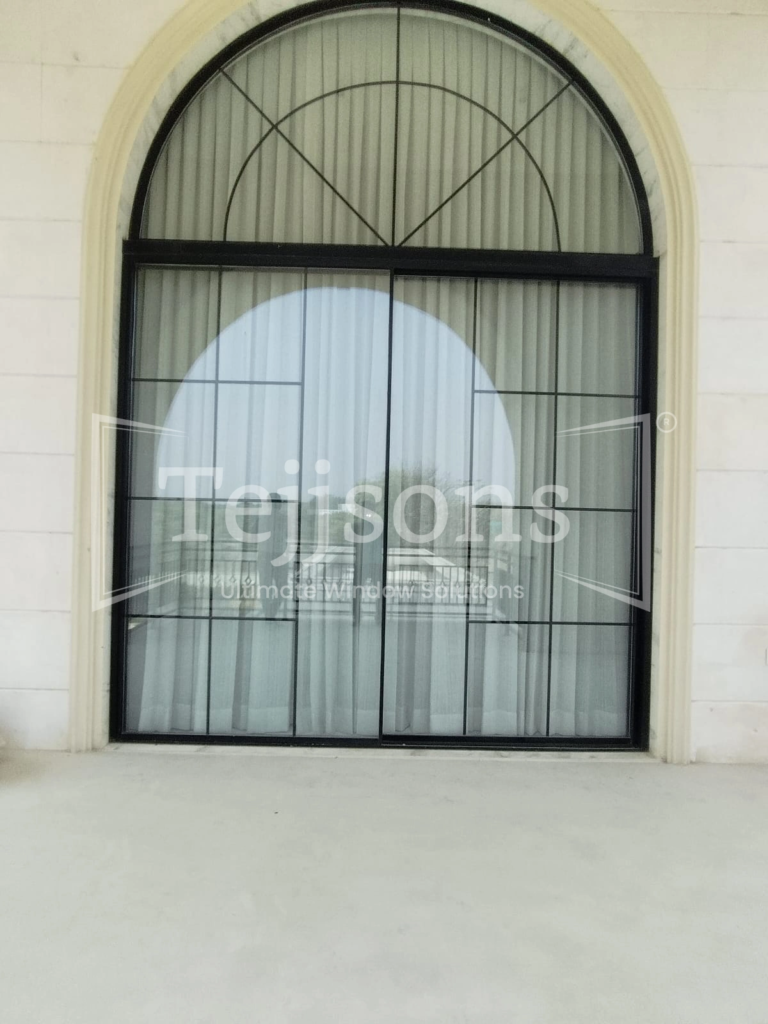 Top 7 Kitchen Window Design Ideas for Scenic Views and Ventilation 3 Large arched kitchen window with elegant grid design